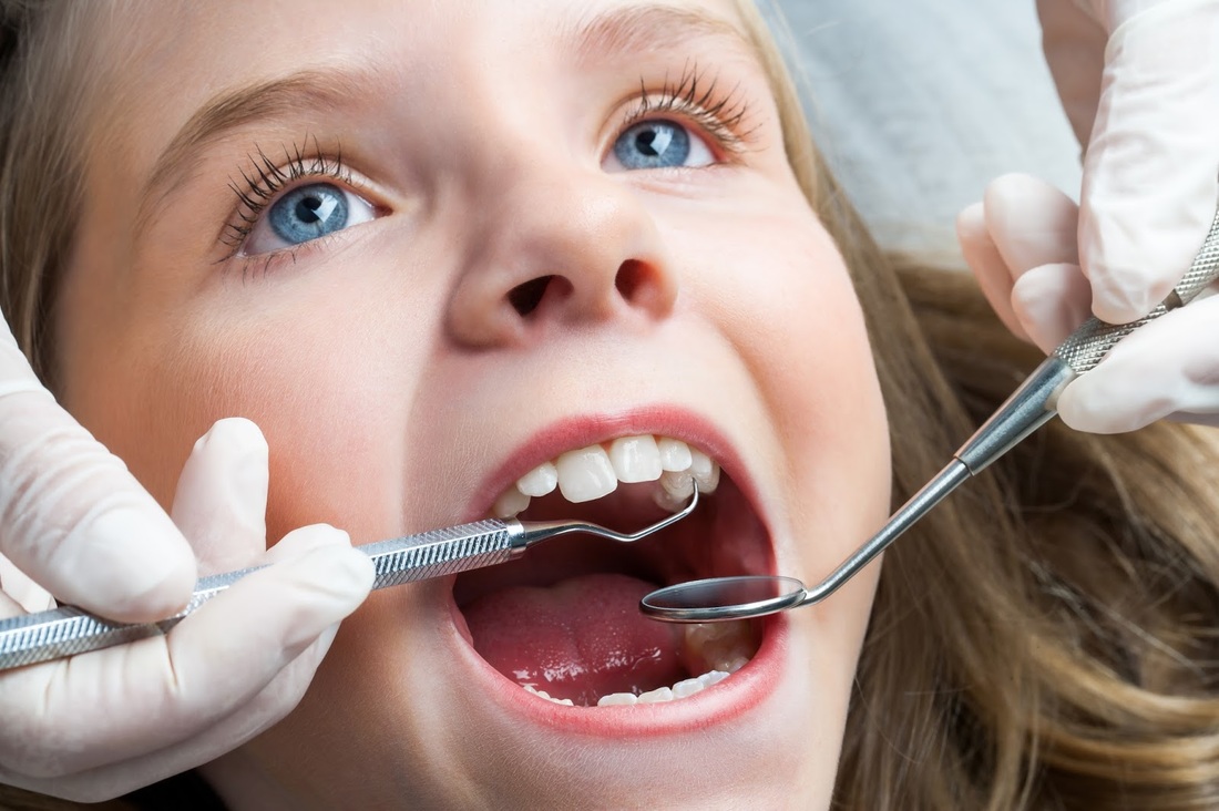 Nhổ răng cho trẻ tại nhà khi nào?